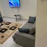 Fully furnished 2 bedroom apartment with a sitting room and kitchen